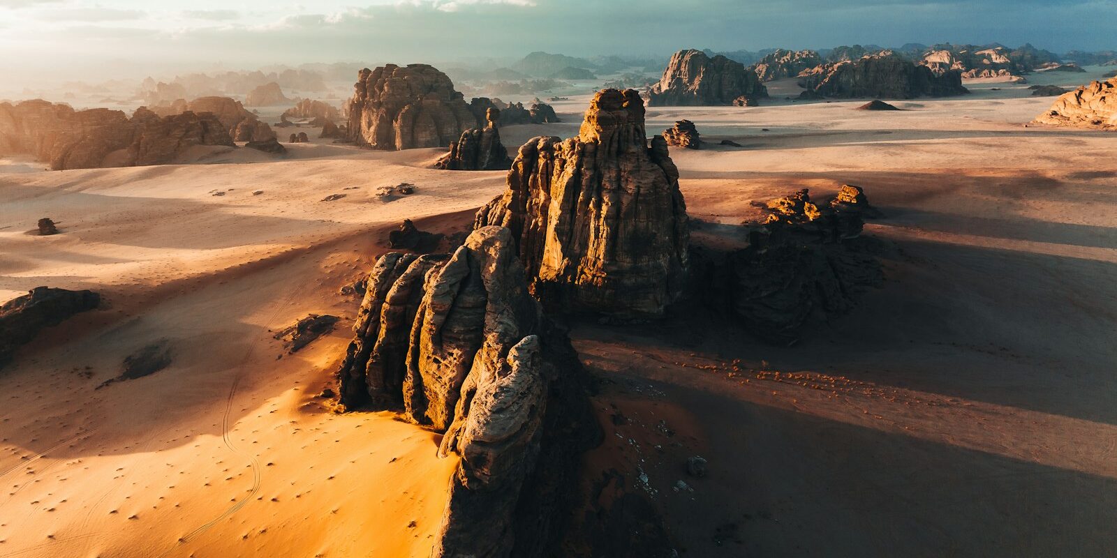 a desert landscape with rocks and sand