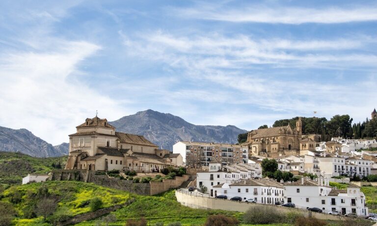 Photo by ELG21 churches, houses, clouds