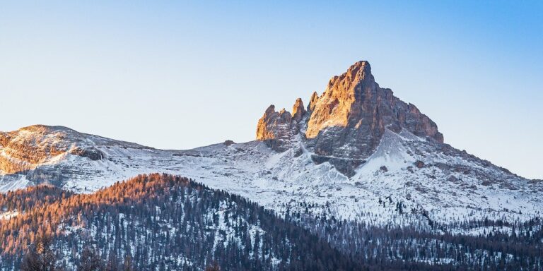 Photo by MARTINOPHUC cortina d'ampezzo, italy, mountains, snow, rocky mountains, snowy mountains, pine forest, sunset, red zone, ski slope, nature