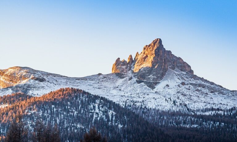 Photo by MARTINOPHUC cortina d'ampezzo, italy, mountains, snow, rocky mountains, snowy mountains, pine forest, sunset, red zone, ski slope, nature