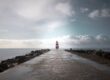 lighthouse, pier, atlantic ocean, portugal, coastline, seascape, jetty, walkway, wet pavement, nature, dramatic sky, clouds, horizon, minimalism, leading lines, symmetry, beacon, maritime, seaside, coastal, travel