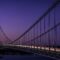 bridge, suspension, cable, nature, architecture, structure, night, twilight, purple sky, long exposure, light trails, river, water, traffic, highway, transportation, engineering, landmark, dusk, evening, infrastructure, dark, moody